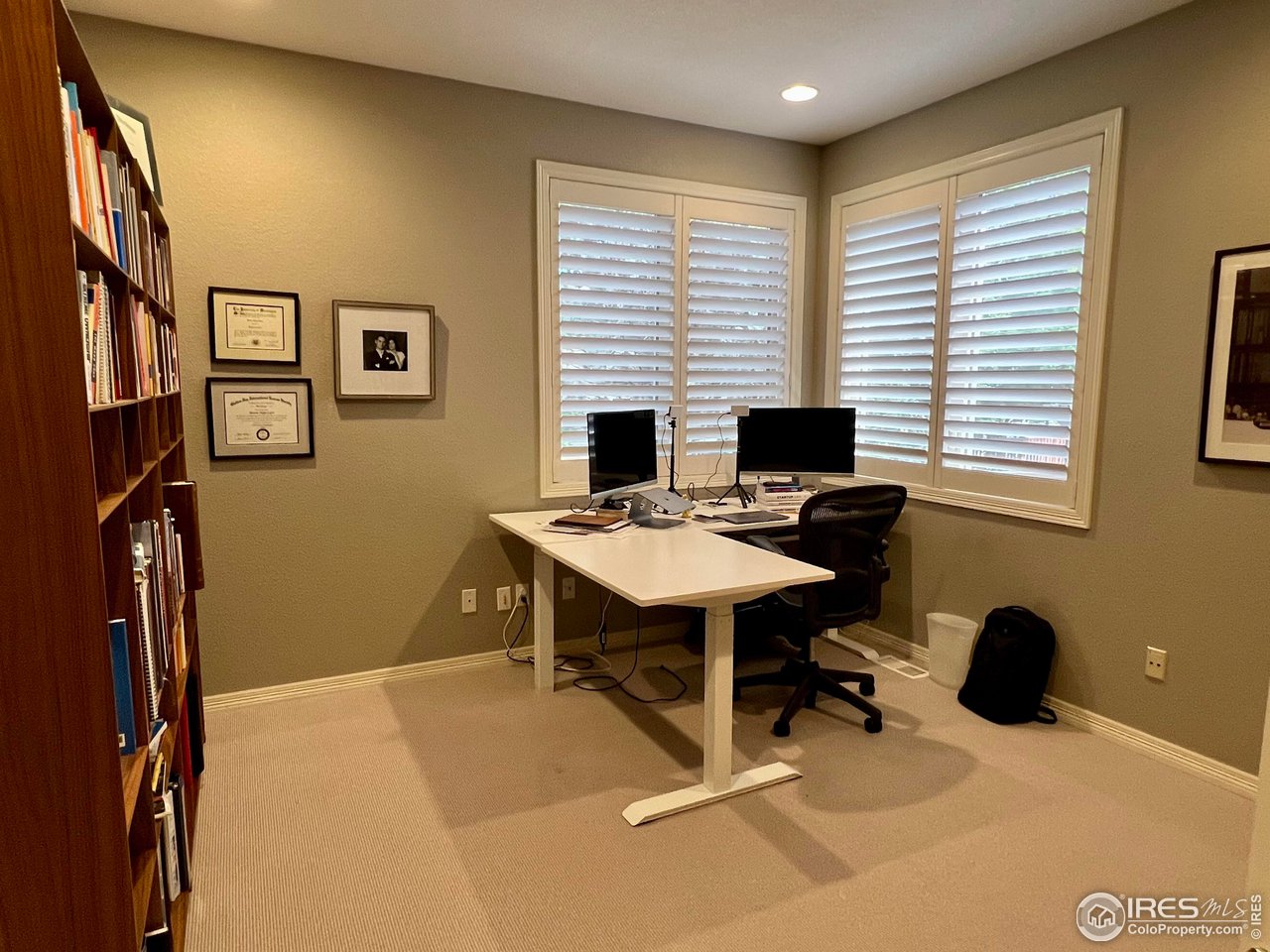 4026 Nevis Street Boulder, CO 80301 - Photo 19 of 40 a view of a workspace with furniture and a window