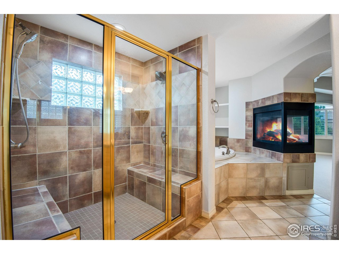 4026 Nevis Street Boulder, CO 80301 - Photo 24 of 40 a picture of a living room and a fireplace