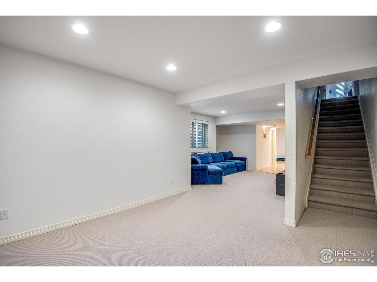 4026 Nevis Street Boulder, CO 80301 - Photo 30 of 40 a view of an empty room with wooden floor
