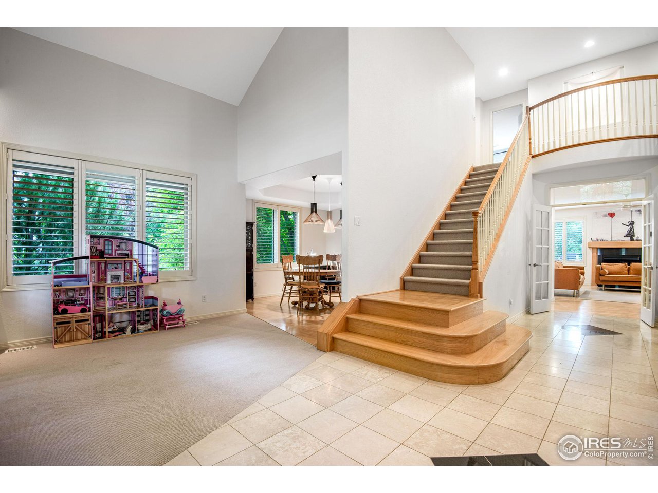 4026 Nevis Street Boulder, CO 80301 - Photo 3 of 40 a living room with furniture and a flat screen tv