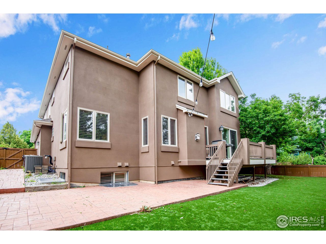 4026 Nevis Street Boulder, CO 80301 - Photo 36 of 40 a view of backyard with a garden and plants