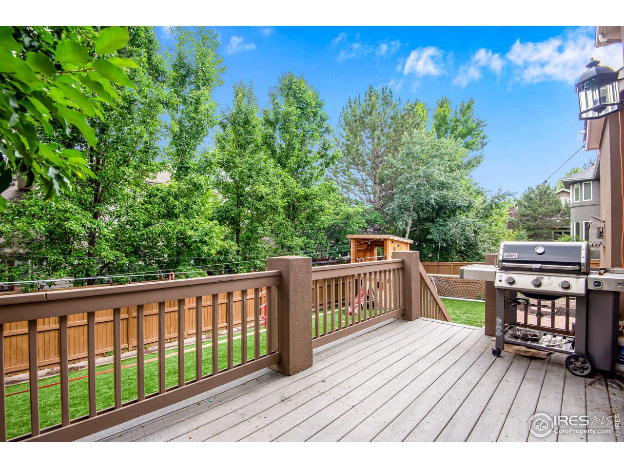 4026 Nevis Street Boulder, CO 80301 - Photo 37 of 40 a view of a two chairs with wooden fence