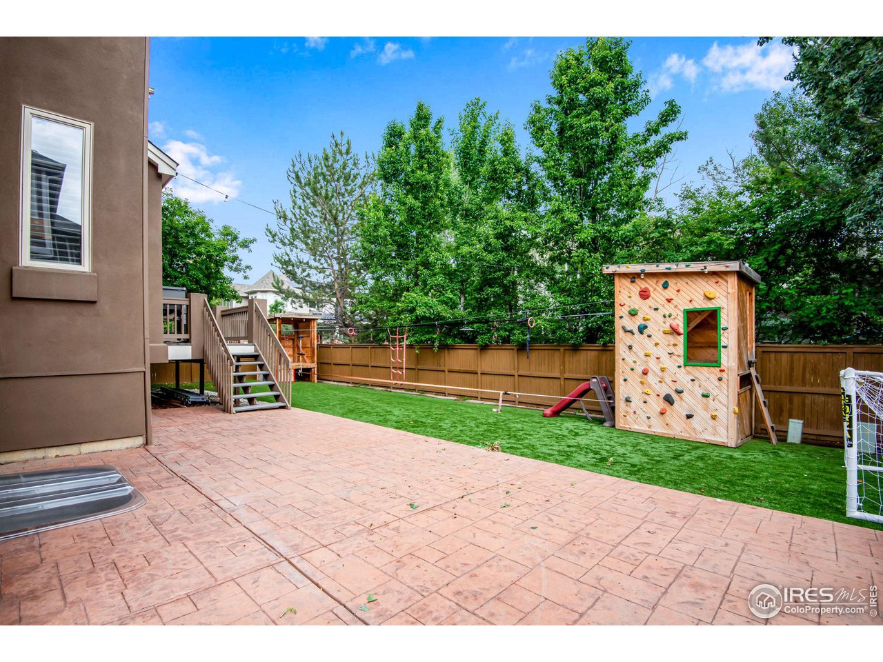 4026 Nevis Street Boulder, CO 80301 - Photo 39 of 40 a view of a park with potted plants and large trees