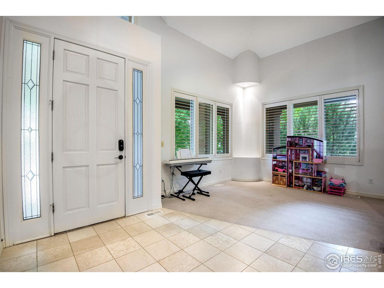 4026 Nevis Street Boulder, CO 80301 - Photo 5 of 40 a living room with furniture and a large window