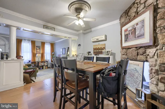 a kitchen with stainless steel appliances granite countertop a stove a sink and a wooden cabinets