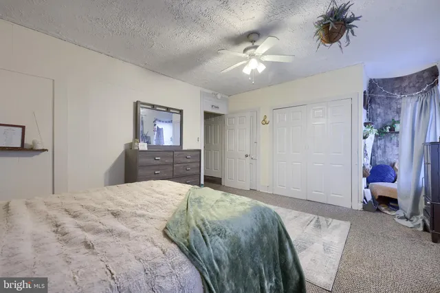 a bathroom with a toilet sink and tub