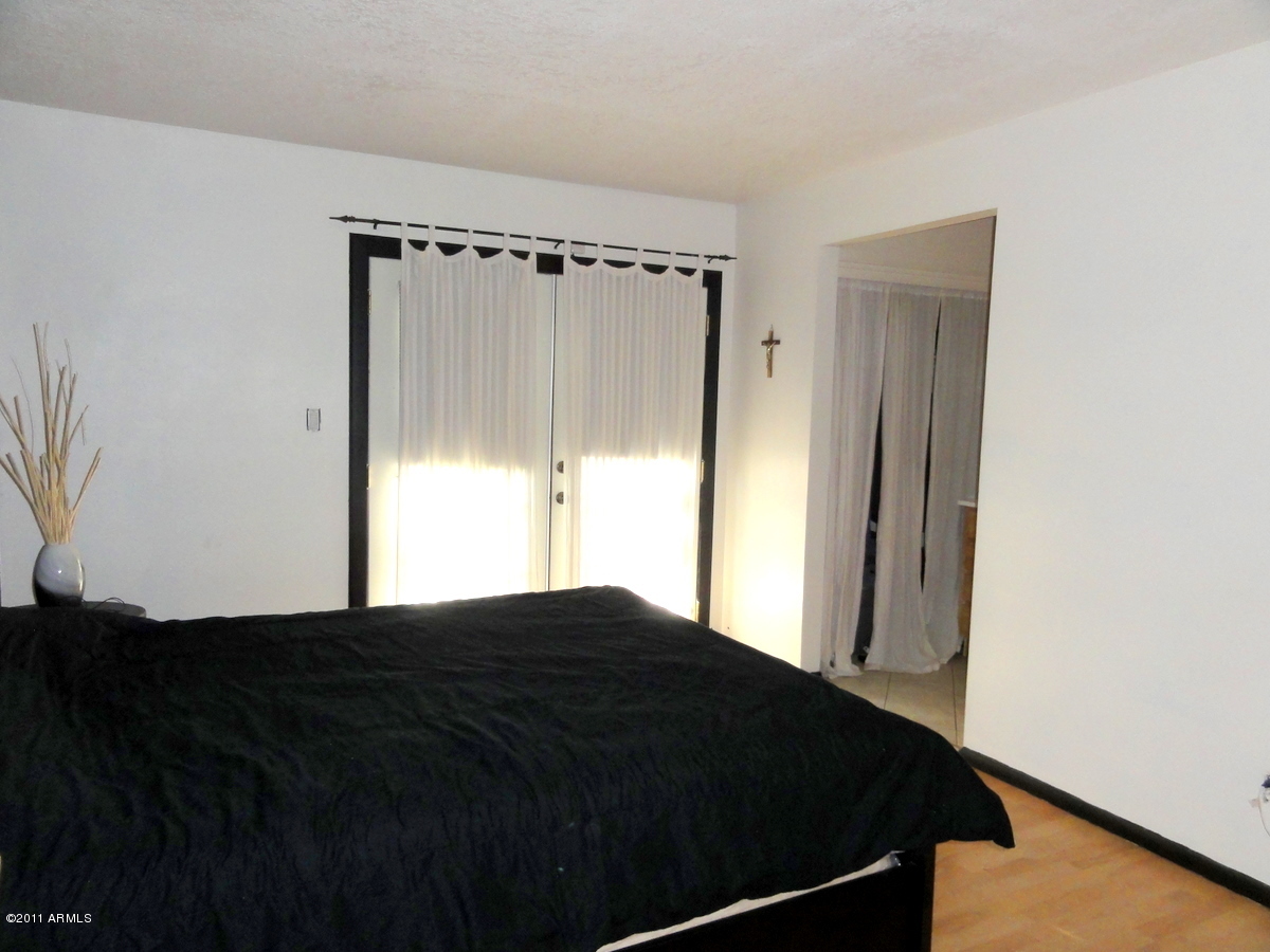 4265 East Vineyard Road Phoenix, AZ 85042 - Photo 10 of 15 Master Bedroom 2