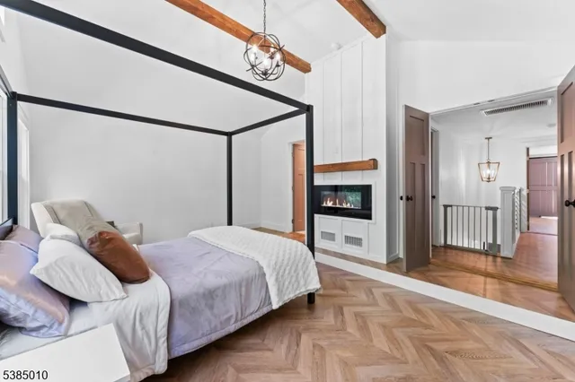 a bed room with a bed and a window