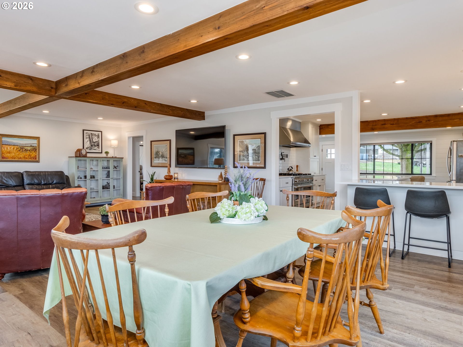 5801 Northeast Abbey Road Carlton, OR 97111 - Photo 11 of 48 a view of a dining room with furniture and wooden floor