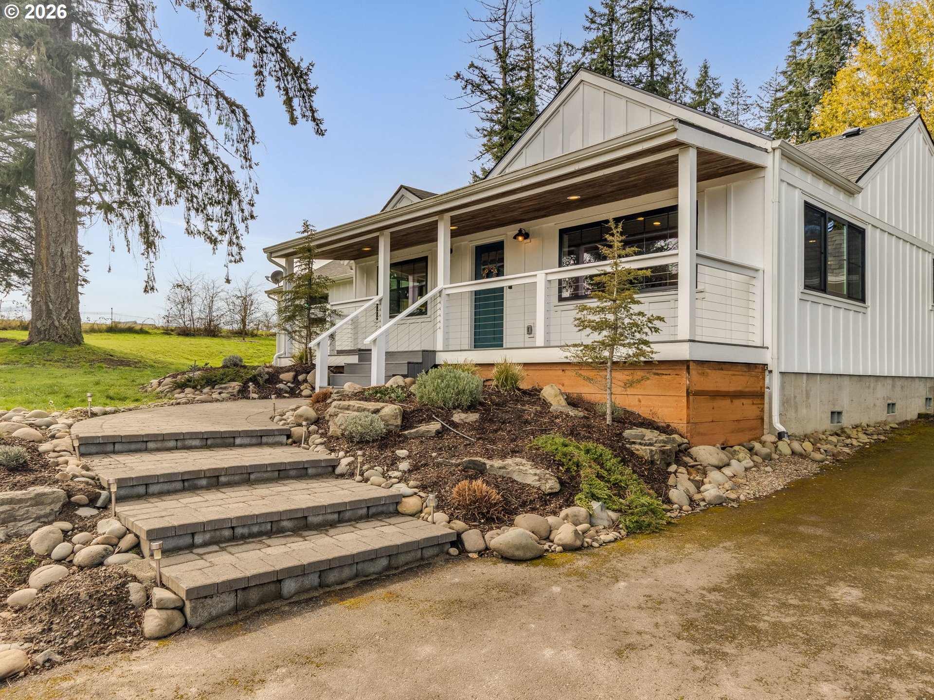 5801 Northeast Abbey Road Carlton, OR 97111 - Photo 2 of 48 a front view of a house with a yard
