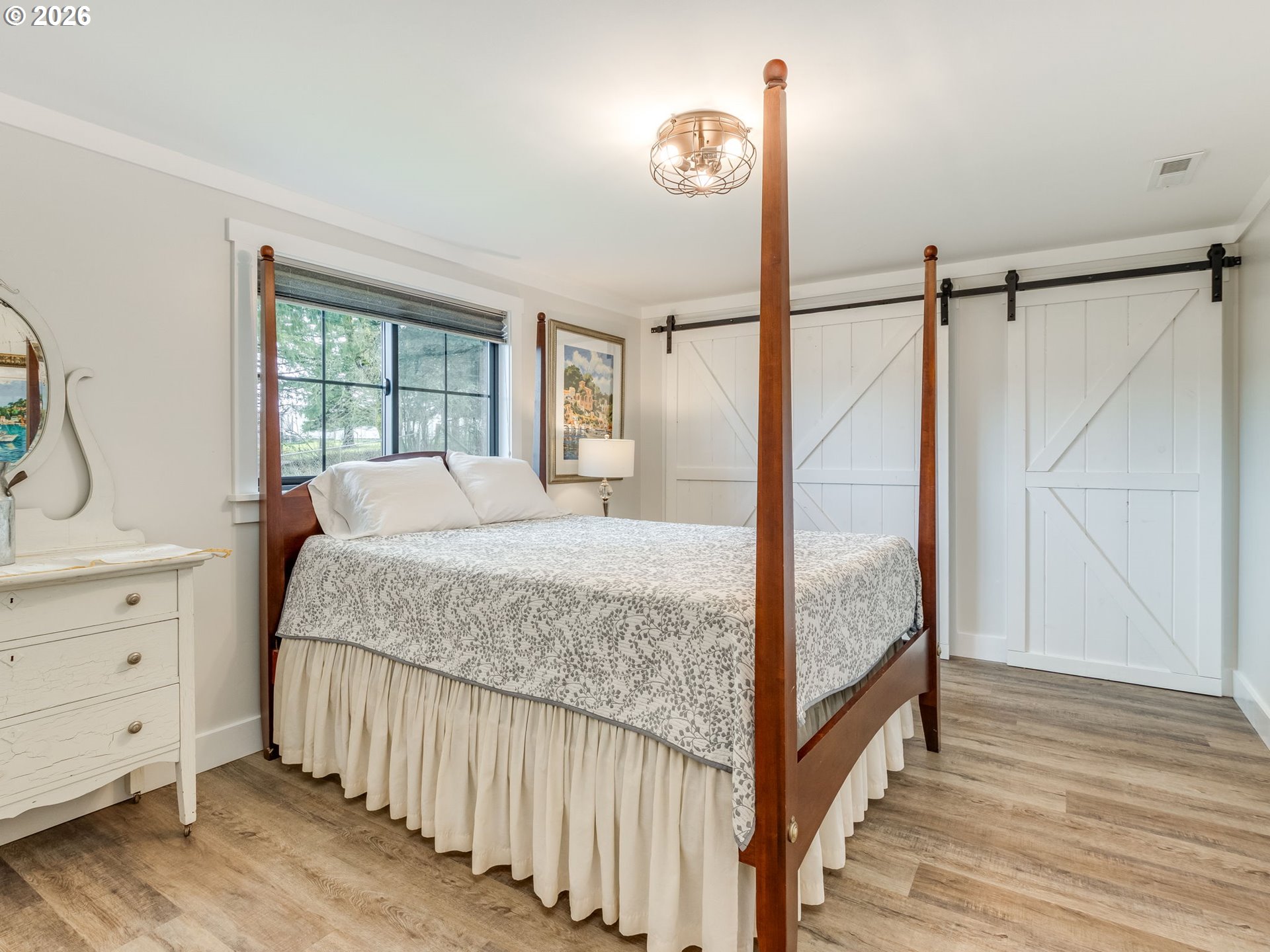 5801 Northeast Abbey Road Carlton, OR 97111 - Photo 24 of 48 a bedroom with a bed and a window