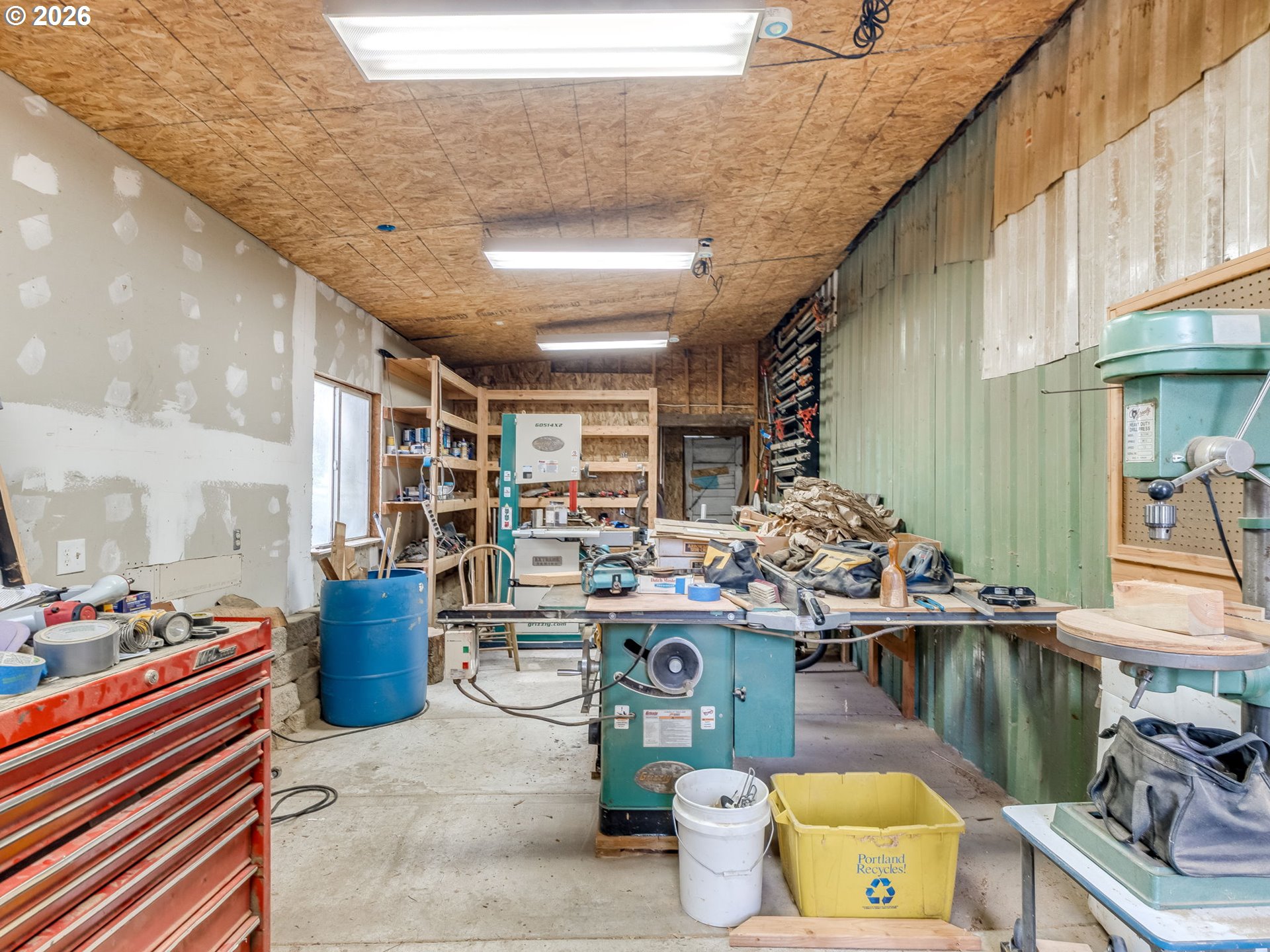 5801 Northeast Abbey Road Carlton, OR 97111 - Photo 32 of 48 a room with lots of clutter and furniture