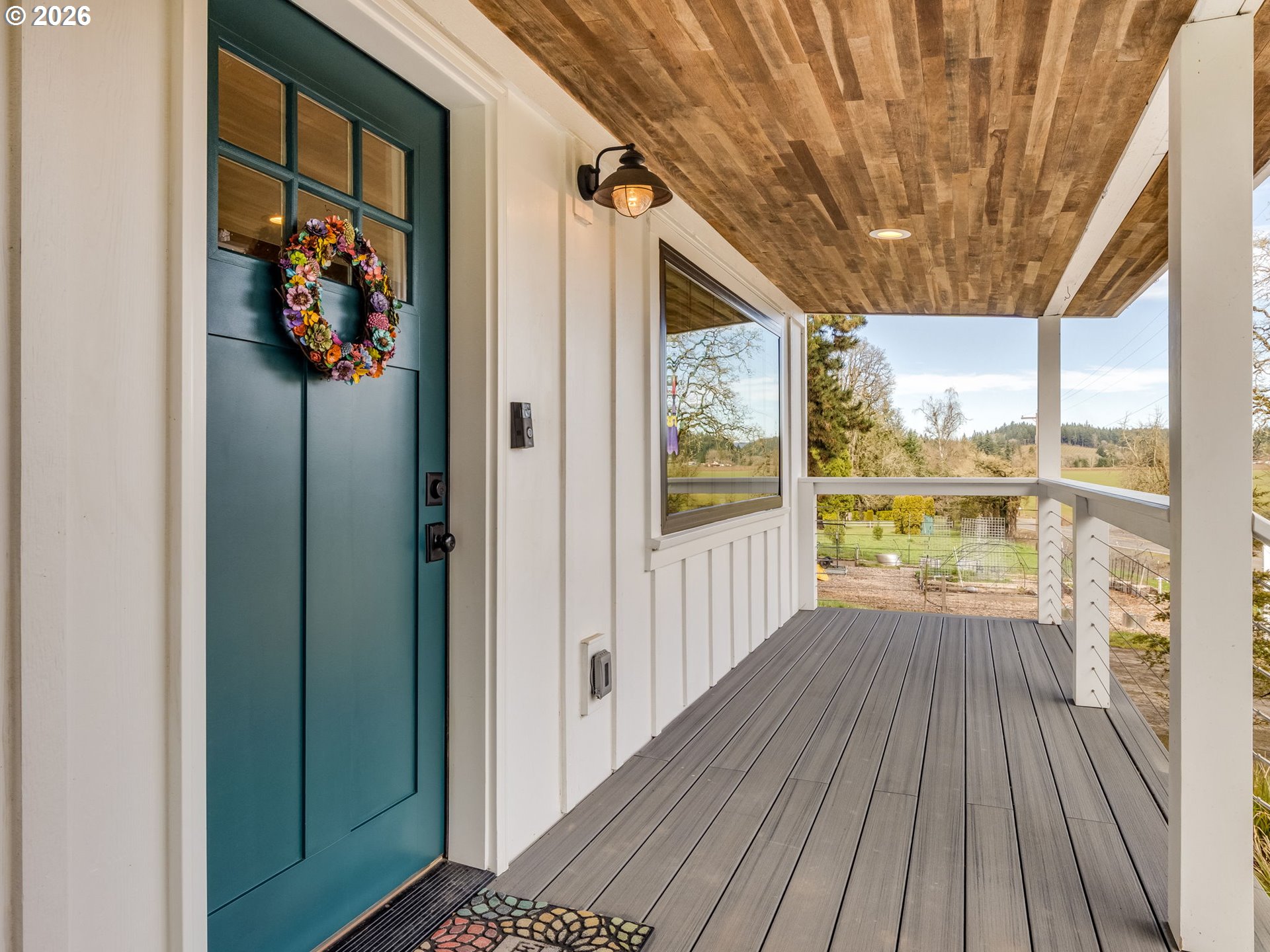 5801 Northeast Abbey Road Carlton, OR 97111 - Photo 4 of 48 a view of a porch with wooden floor and outdoor space