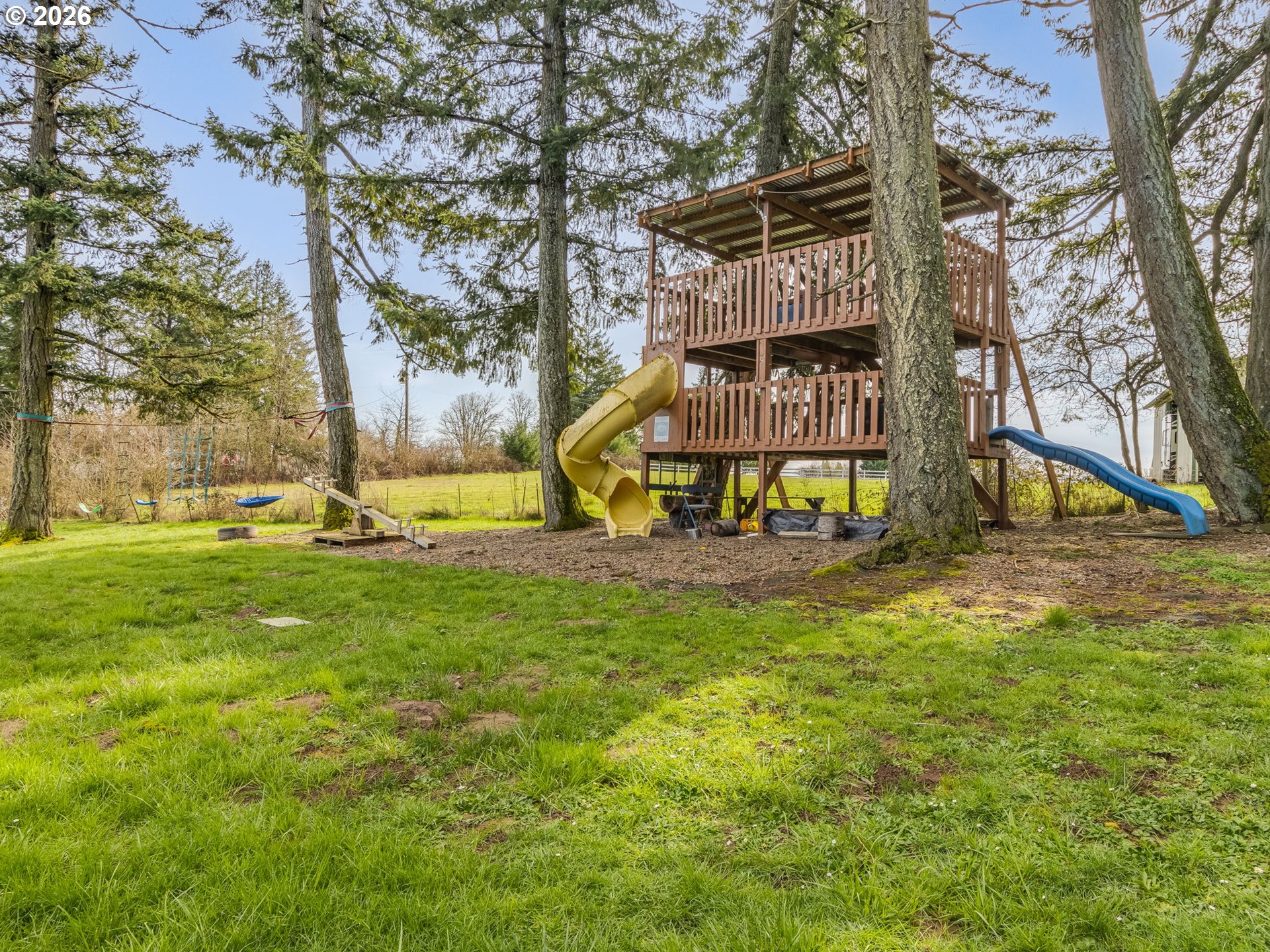 5801 Northeast Abbey Road Carlton, OR 97111 - Photo 42 of 48 a view of a park with swings and slides