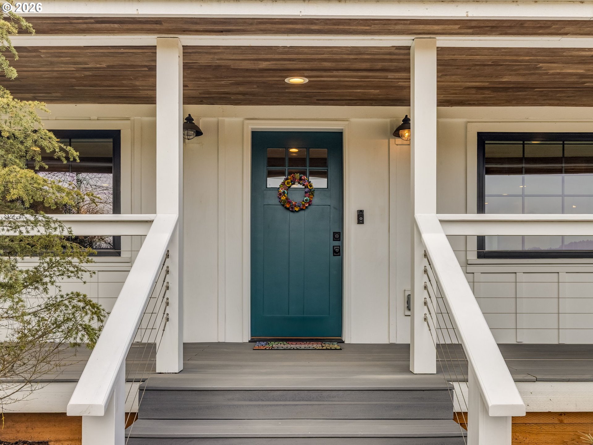 5801 Northeast Abbey Road Carlton, OR 97111 - Photo 5 of 48 a view of staircase with white walls and a fireplace