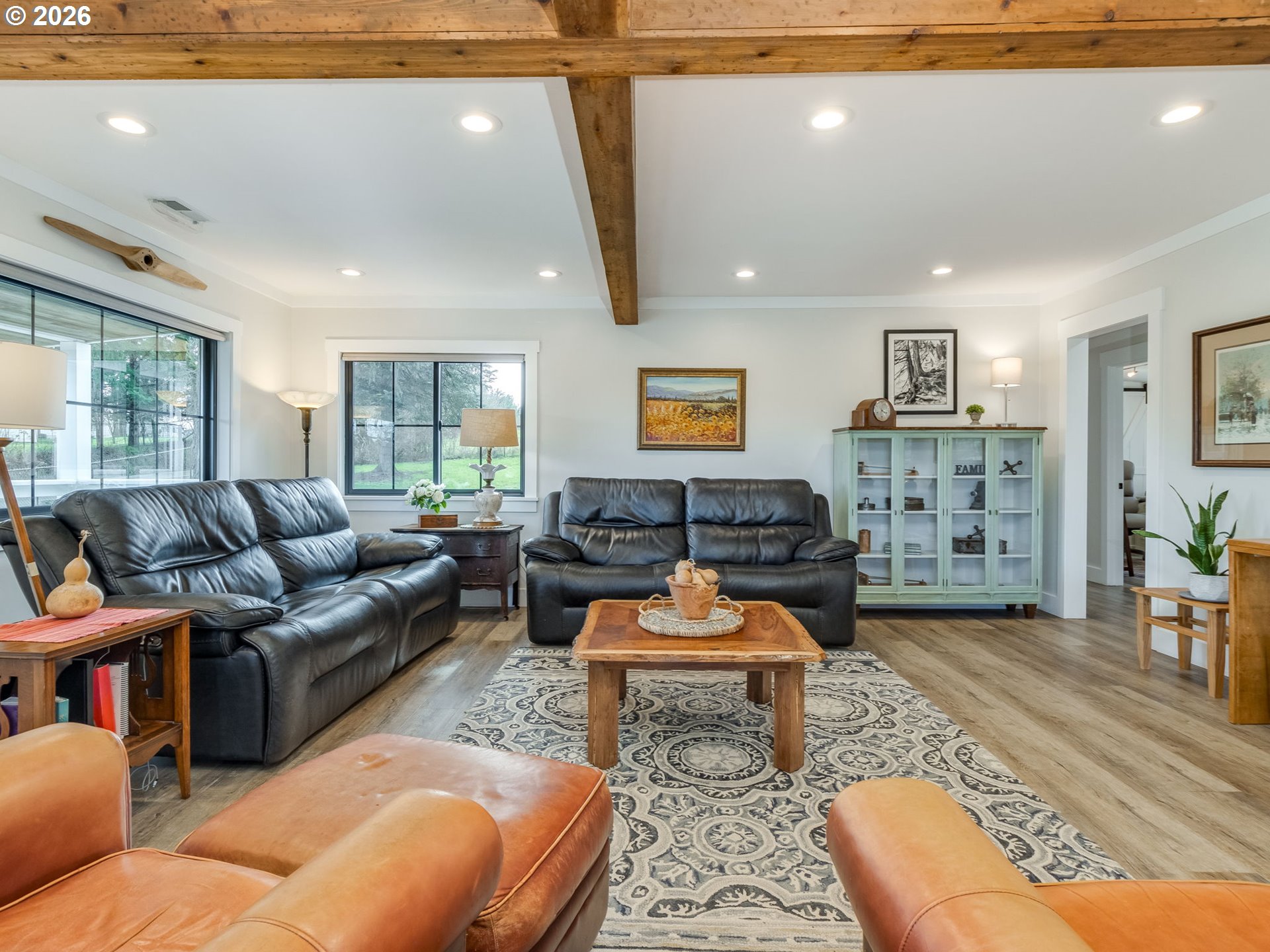 5801 Northeast Abbey Road Carlton, OR 97111 - Photo 7 of 48 a living room with furniture a couch and wooden floor