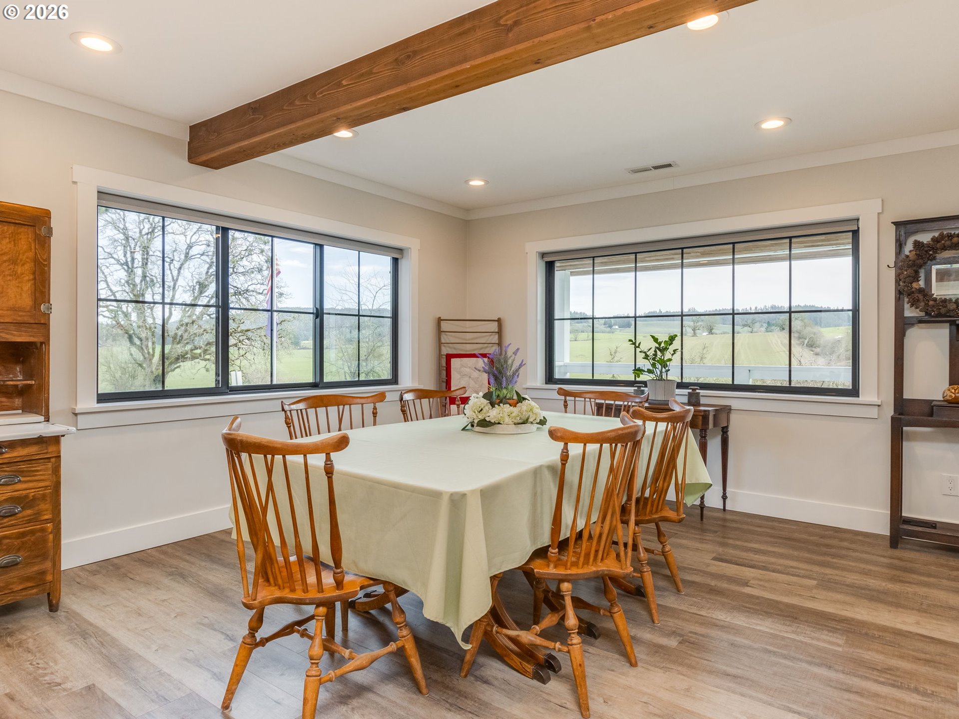 5801 Northeast Abbey Road Carlton, OR 97111 - Photo 10 of 48 a view of a dining room with furniture and wooden floor