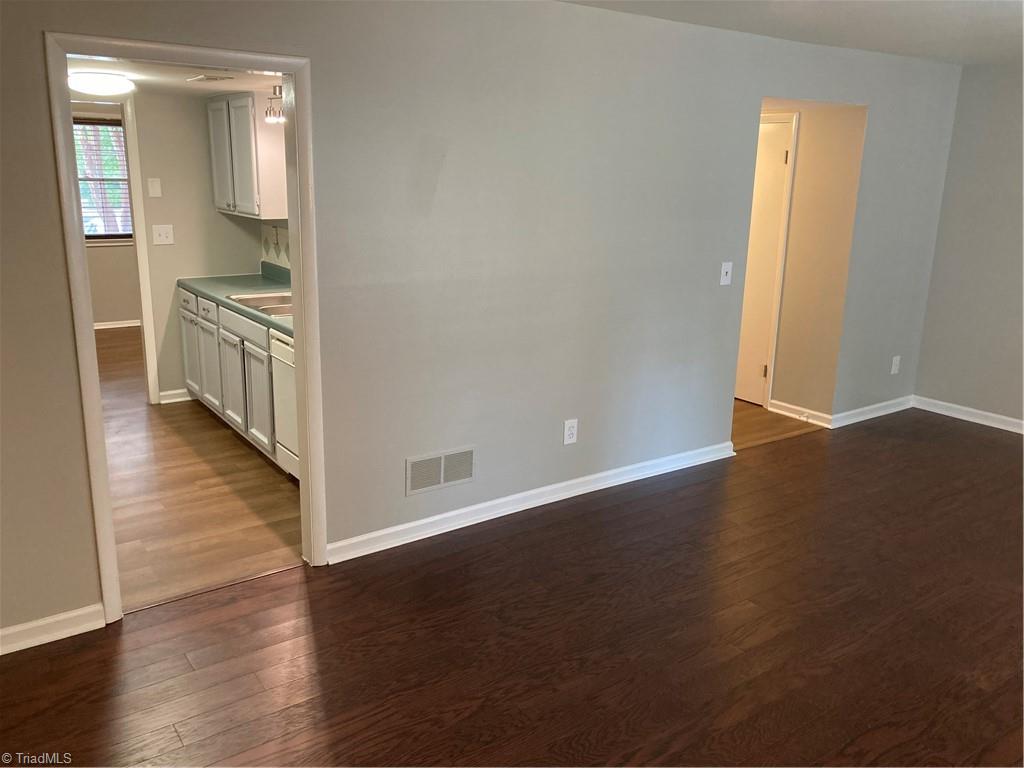 2930 St Marks Road Southwest, Unit E Winston-Salem, NC 27103 - Photo 11 of 49 Behind kitchen is the huge (12'x21') living room.