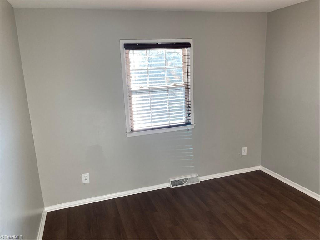 2930 St Marks Road Southwest, Unit E Winston-Salem, NC 27103 - Photo 28 of 49 Right rear bedroom's back wall.