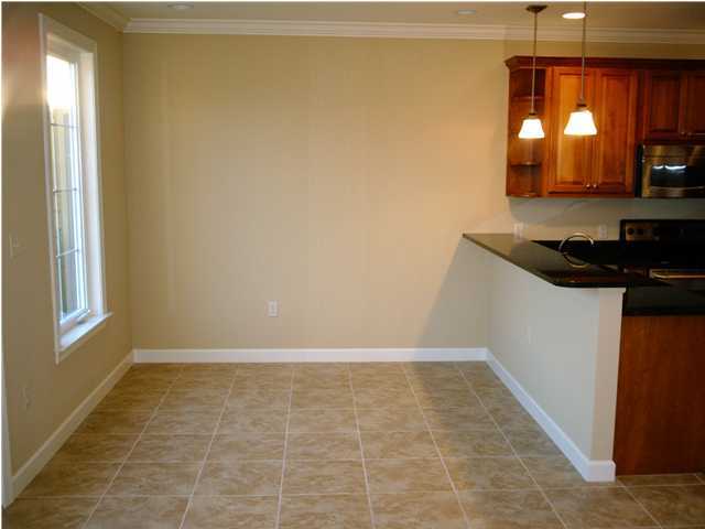 73 South Church Street, Unit 2 Santa Rosa Beach, FL 32459 - Photo 5 of 18 a view of a kitchen with a sink and dishwasher in it
