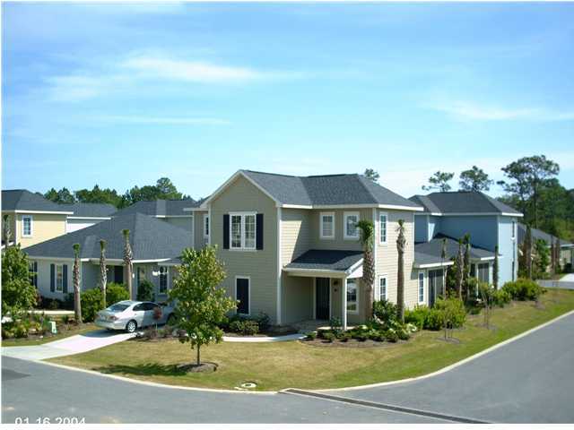 73 South Church Street, Unit 2 Santa Rosa Beach, FL 32459 - Photo 10 of 18 a front view of multiple houses with yard