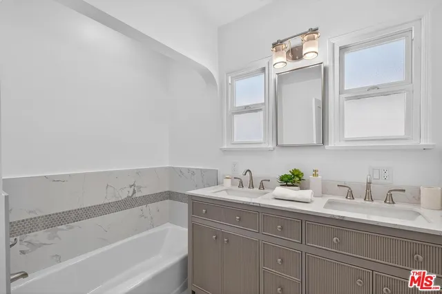 a porch with seating space and garden