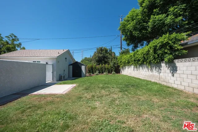 a house view with a garden space
