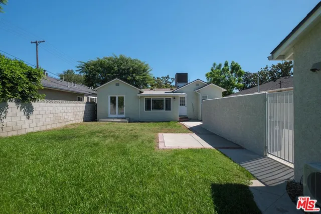 a living room with furniture a fireplace