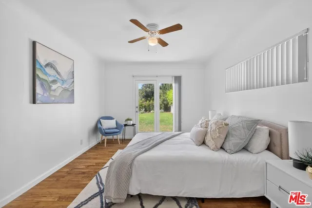 a view of kitchen and wooden floor
