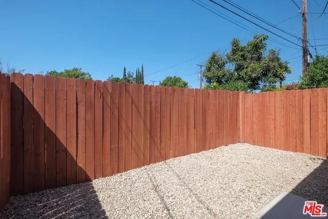 a kitchen that has a sink and a stove