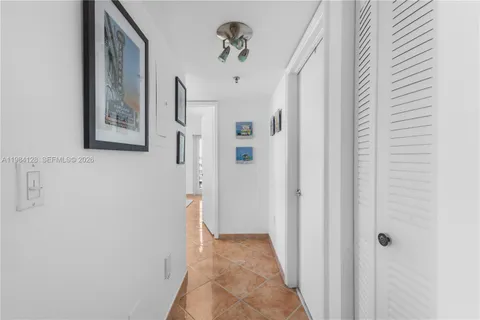 a bedroom with a bed and a closet