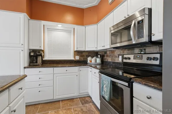 $479,000 | 131 Evergreen Condo Drive, Unit 1B, Sunrise Beach, MO 65079