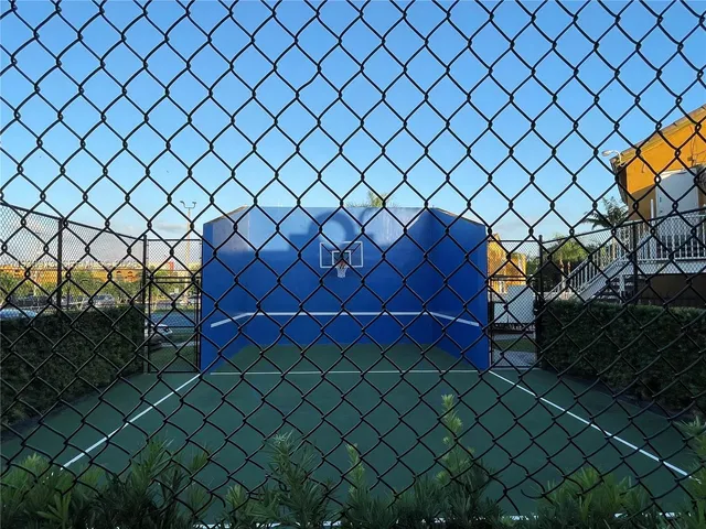 a view of swimming pool with outdoor seating and city view