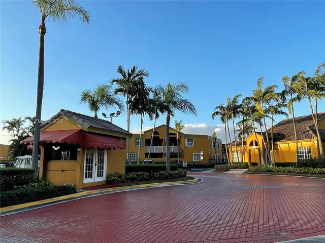 a view of a street with cars