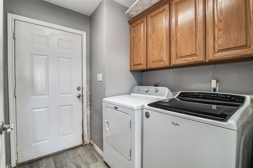 2900 County Road 643 Nevada, TX 75173 - Photo 16 of 36 a utility room with dryer and washer