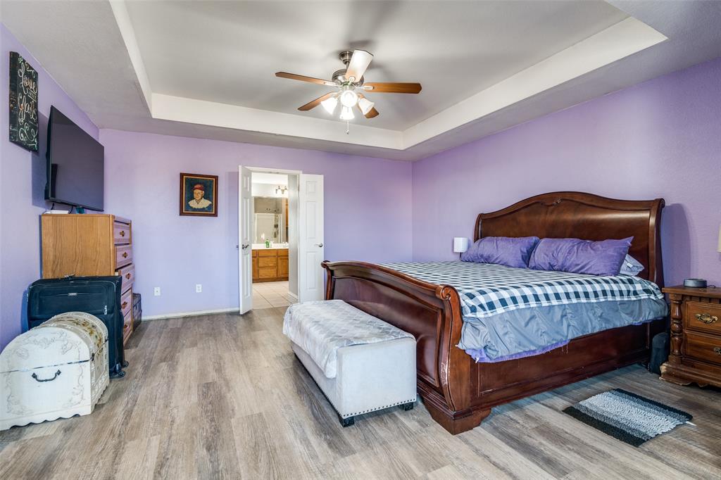 2900 County Road 643 Nevada, TX 75173 - Photo 27 of 36 a bedroom with a bed and window