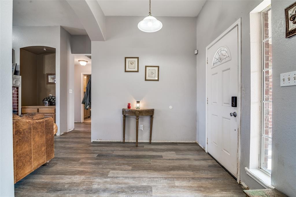 2900 County Road 643 Nevada, TX 75173 - Photo 5 of 36 a view of a hallway with wooden floor and staircase