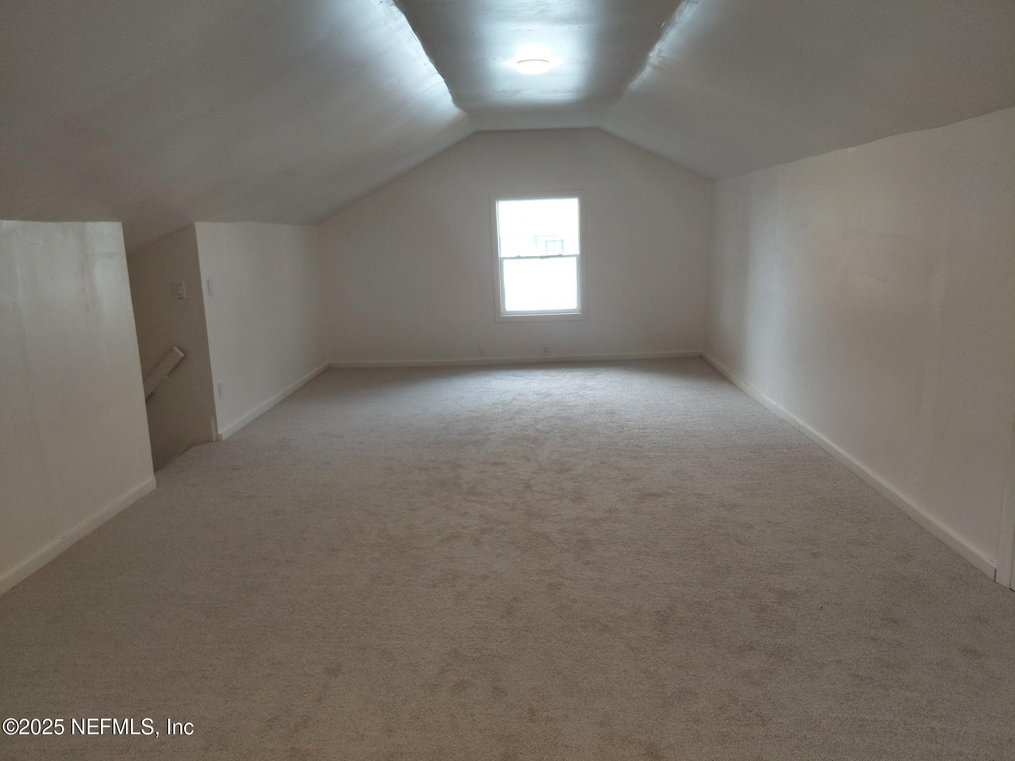 232 South Main Street Crescent City, FL 32112 - Photo 23 of 24 a view of an empty room with a window