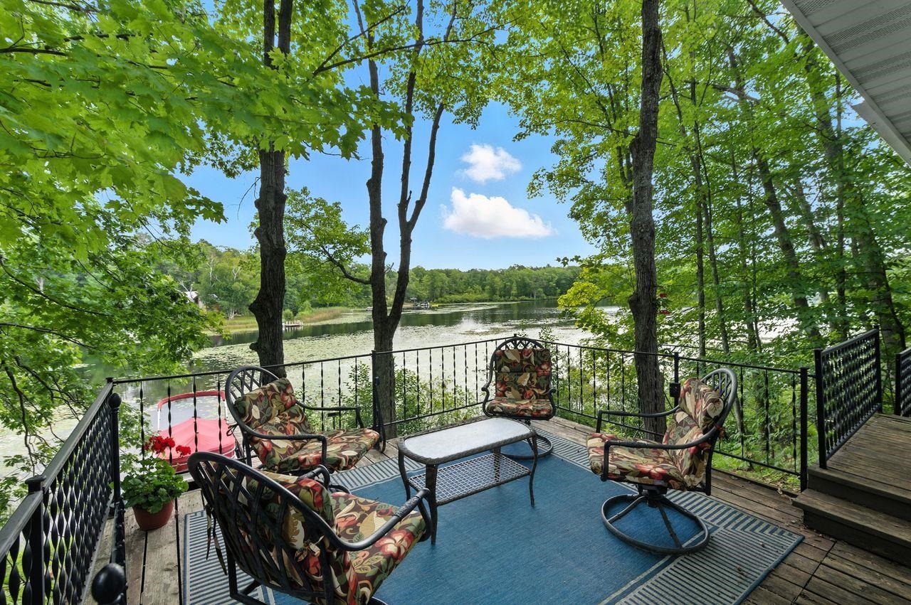 10570 Eagle Lake Road Delta, WI 54847 - Photo 16 of 24 Deck featuring a water view