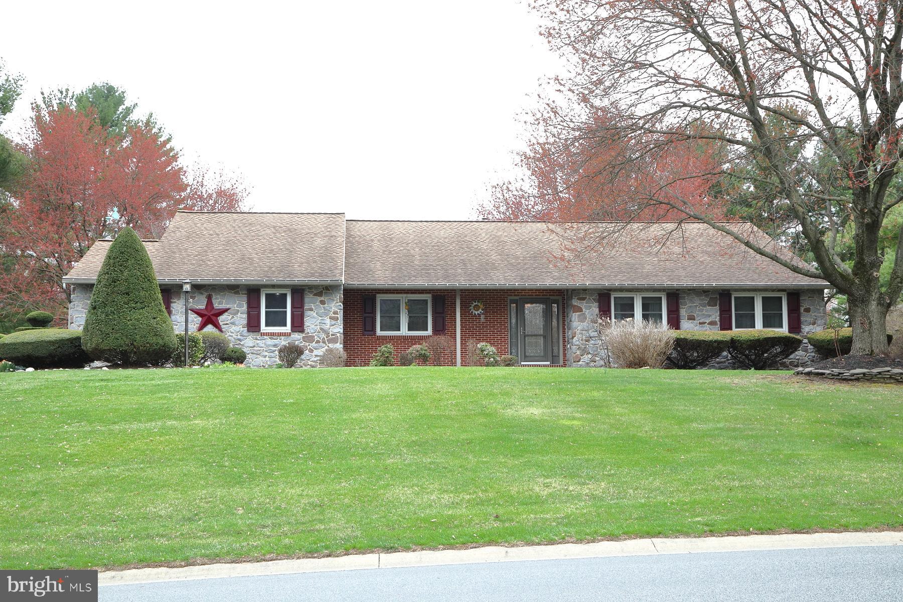 509 Koser Road Lititz, PA 17543 - Photo 1 of 36 a view of a house with a yard and sitting area