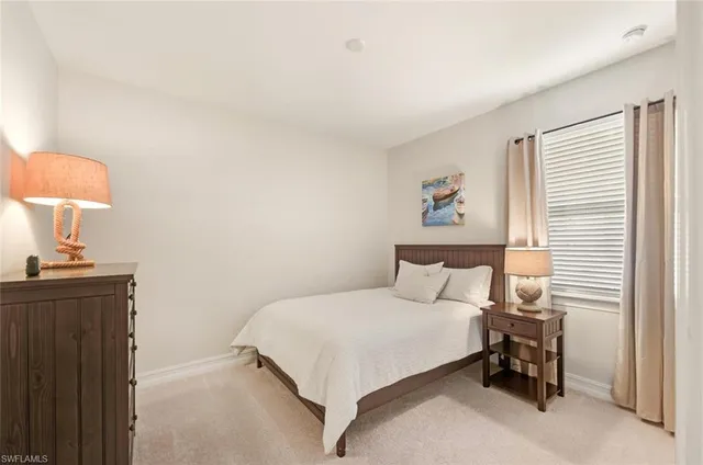 a spacious bathroom with a double vanity sink and a mirror