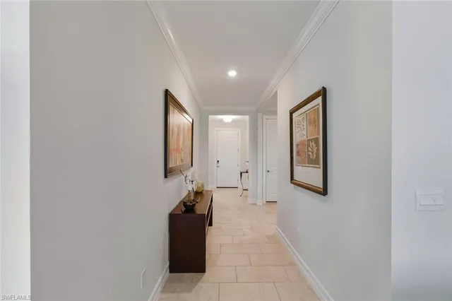 a bedroom with a bed and a dresser in it