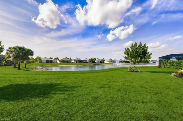a view of a golf course with a lake