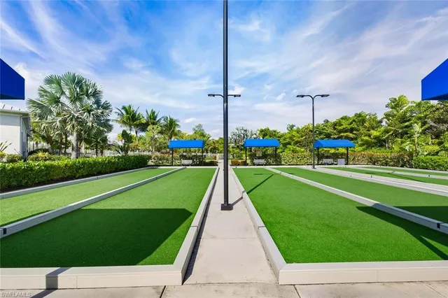 a view of a street with a building in the background