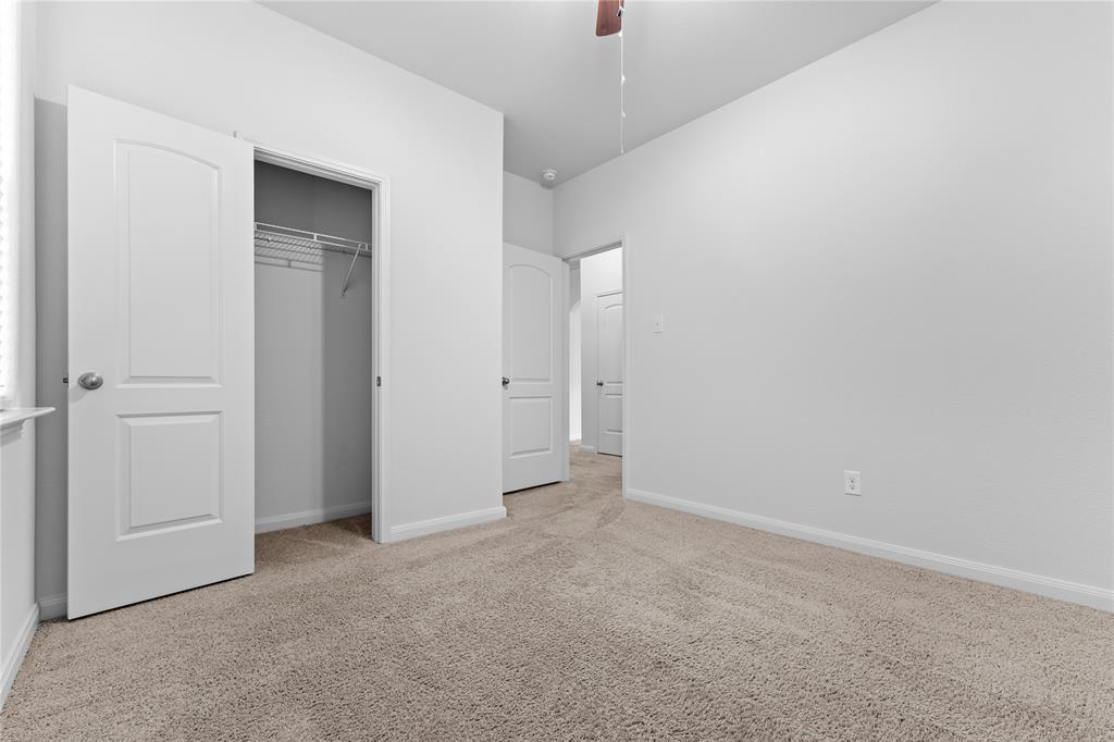 1815 Hot Springs Way Princeton, TX 75407 - Photo 11 of 22 an empty room with closet area