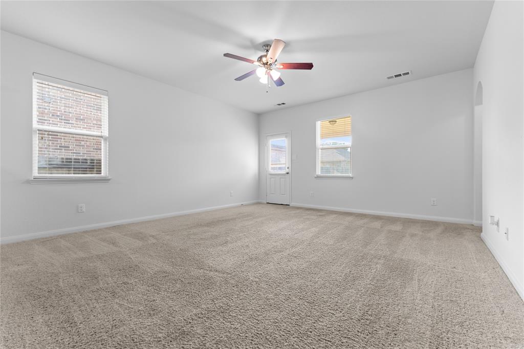 1815 Hot Springs Way Princeton, TX 75407 - Photo 21 of 22 a view of an empty room with a window