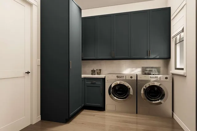 a kitchen with a refrigerator and a stove top oven