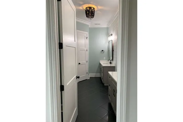 a view of living room with furniture and a table