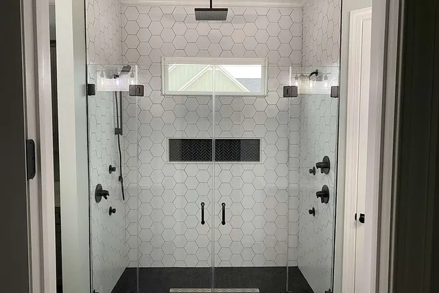 a kitchen with a sink a stove and chairs