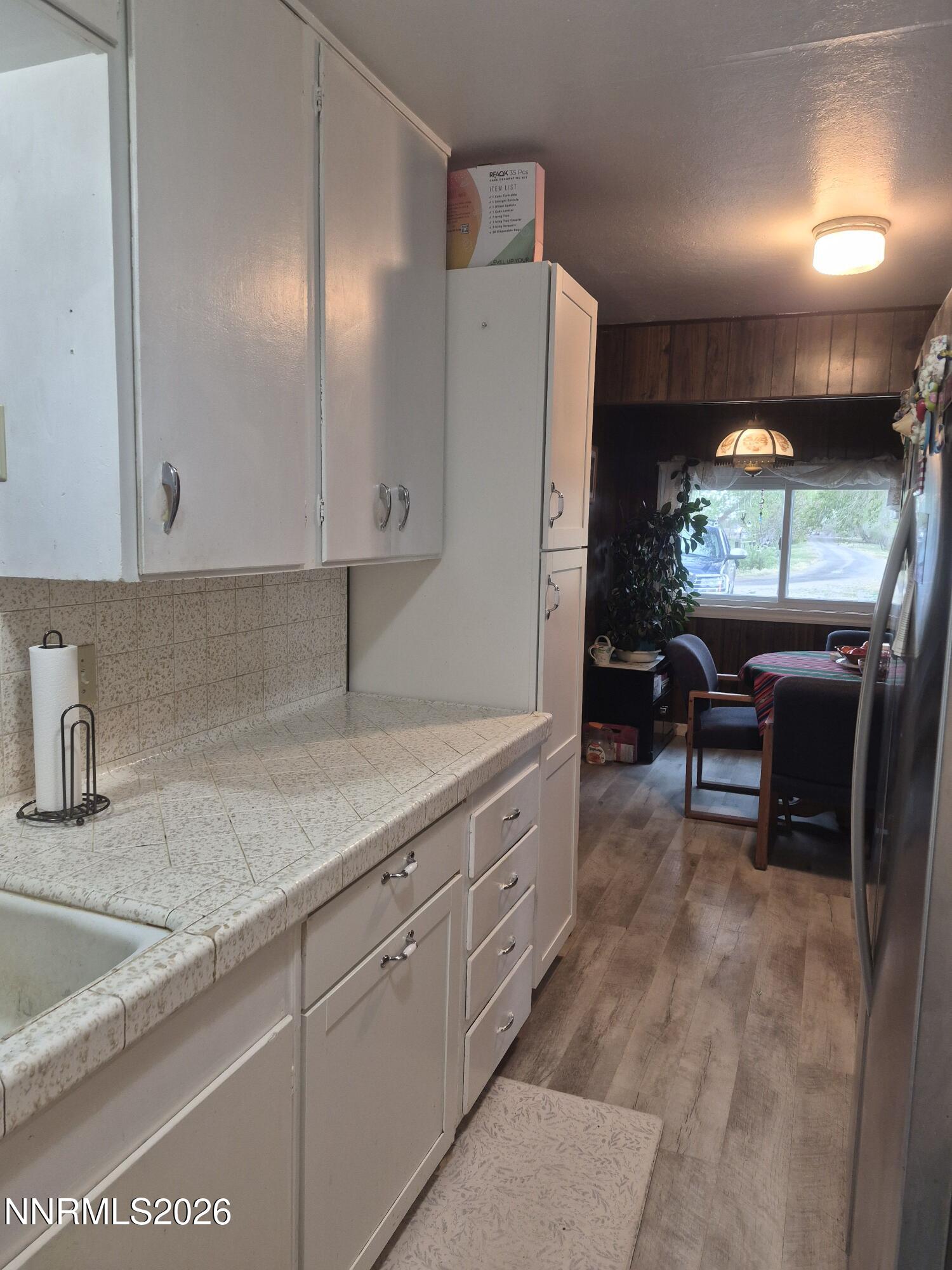 3280 Lone Tree Road Fallon, NV 89406 - Photo 41 of 59 a kitchen with stainless steel appliances granite countertop a sink a stove and a refrigerator